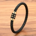 Men's woven black leather bracelet with striped gold and black magnetic clasp on wood - 19cm / Gold