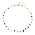 Golden necklace with irregular purple and green raw crystal stones on a white background - Agate and Amethyst Necklace