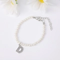 Elegant pearl bracelet featuring a micro-pave zircon letter D charm and silver chain - Letter D / Silver