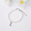 Elegant pearl bracelet with crystal-inlaid letter L pendant and adjustable chain extender - Letter L / Silver