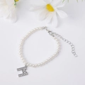 Elegant pearl bead bracelet featuring a sparkling zircon letter M pendant and silver clasp - Letter M / Silver