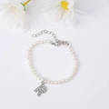 Elegant white pearl bracelet featuring a micro-set zircon letter R silver-tone pendant - Letter R / Silver