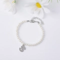 Elegant pearl bracelet with a micro-paved cubic zirconia letter S pendant and lobster clasp - Letter S / Silver
