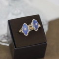 Vintage gold star ring with marquise labradorite stones in a velvet jewelry box - US 5