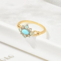 Macro detail of retro gold-plated S925 silver ring with turquoise and opal stones - US 5 / Gold/Light Blue