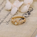 Macro detail of crown shaped S925 silver gold ring with opal and white zircon stones - US Size 5 / Opal Style