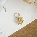 Macro detail of S925 sterling silver four-leaf clover pendant with green gemstones - Clover Pendant