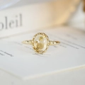 Vintage gold ring with oval amber-style stone featuring an internal golden flower design - Citrine Ring / Size 5