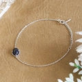 Close-up of S925 silver bracelet with oval blue sandstone in a four-prong setting - Blue Sandstone Bracelet (925 Silver)