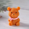 Miniature orange resin bear figurine with knit texture and pink scarf for gardens - Orange