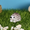 Figura de erizo miniatura de resina con púas marrones para decorar plantas y jardín - Pose Sentada (2号)