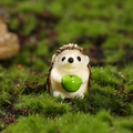 Miniature hedgehog figurine holding a green apple for bonsai and moss landscape decor - Hedgehog with Green Apple