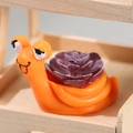 Miniature orange snail figurine with purple succulent for moss micro landscape decor - Orange