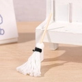 Miniature handmade wooden broom with white cotton bristles for dollhouse decor - White