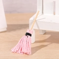 Miniature handmade dollhouse broom with wood handle and pink cotton fiber brush - Pink
