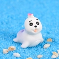 Miniature figurine de phoque en résine avec pois violets et nœud rose pour décor - Fille Otarie Blanc Violet