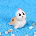 Miniature resin seal figurine with orange spots and pink decor for ocean landscape - Orange Spotted Sea Lion Daughter / White