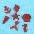 7-piece red resin ocean accessories featuring seahorses and starfish with grid texture - Red