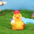 Miniature yellow chick figurine wearing a red cap and holding a book for succulents - Yellow Duck With Red Hat And Backpack (3号)