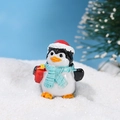Christmas penguin resin figurine with red hat and gift box on a snowy base - Christmas Penguin
