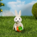 Miniature white rabbit resin figurine holding a carrot on green grass background - White Rabbit Holding Carrot (Style 2)
