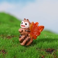 Micro landscape miniature animal figurine featuring a cute insect with a red autumn leaf - Holding Maple Leaf Style / Ant