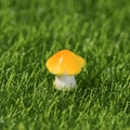 Miniature yellow resin mushroom figurine with glossy gradient cap for garden decor - Mushroom