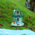 Miniature resin cartoon tree house with blue walls and green roof for DIY landscaping - No.6 Blue Spire House
