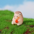 Miniature resin hedgehog figurine holding a red fruit for succulent micro landscape - Holding Fruit Style / Hedgehog