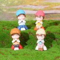 Cute couple figurines for moss landscape decor featuring four praying dolls on green lawn - Wishing Boy and Girl Style