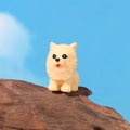 Miniature resin Pomeranian dog figurine with fluffy texture on a rustic wood base - Beige Pomeranian Style (No.5)