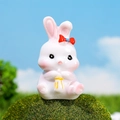 Pink resin rabbit miniature with red bow and heart paws for fairy garden decor - Rabbit with Baby Bottle