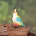Miniature resin blue and white parrot figurine on wood base for garden decor - Yellow