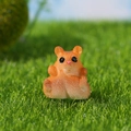 Süße orangefarbene Hamsterfigur für Miniaturlandschaften und DIY-Gartendeko - Sitzender Hamster (Stil C)