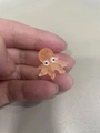 Miniature translucent orange octopus resin ornament held by hand to show micro size - Orange Little Octopus (Style I)