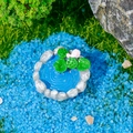 Miniature dollhouse garden lotus pond with realistic stones and green lily pads - Pool