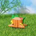 Miniature orange resin tree stump figurine with red mushrooms for DIY garden decor - Stump