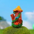 Miniatur Feengarten Baumstumpfhaus mit orangefarbenem Dach und bunten Blumendetails - Stumpfhaus