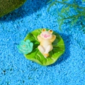 Miniature resin frog resting on green lotus leaf for aquarium landscape decoration - Style E
