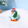 Niedliche Pinguin-Figur aus Harz mit Weihnachtsmannmütze und Baum für Winterdeko - Pinguin mit Weihnachtsbaum