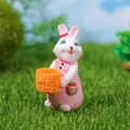 Miniature white rabbit figurine in pink dress with basket for succulents decor - Pink Rabbit With Flower Basket