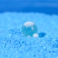 Blue and white sphere gel bead on blue textured granule base for micro landscape decor - Style J