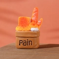 Miniature resin bread basket figurine with baguettes and Pain text on brown base - Style G
