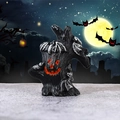 Halloween dead tree stump resin ornament featuring pumpkin faces and black bats - Bat Tree