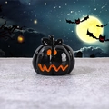 Halloween black glossy resin pumpkin figurine with orange devil smile and full moon backdrop - Jack Evil Pumpkin
