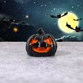 Halloween black Jack-o'-lantern pumpkin resin figurine with glowing orange face details - Classic Smile Pumpkin