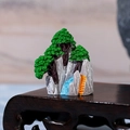 Miniature resin rockery mountain ornament with pine trees and a flowing waterfall - Style C