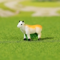 Miniature resin cow figurine in white and orange for DIY micro landscape decor - White and Orange Cow (Style I)