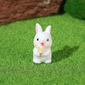 Miniature resin rabbit figurine holding a yellow ice cream on a green grass field - Ice Cream Style (Style F)
