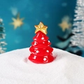 Miniatur-Weihnachtsbaum in Rot mit goldenem Stern und weißen Punkten als Deko - Roter Weihnachtsbaum
